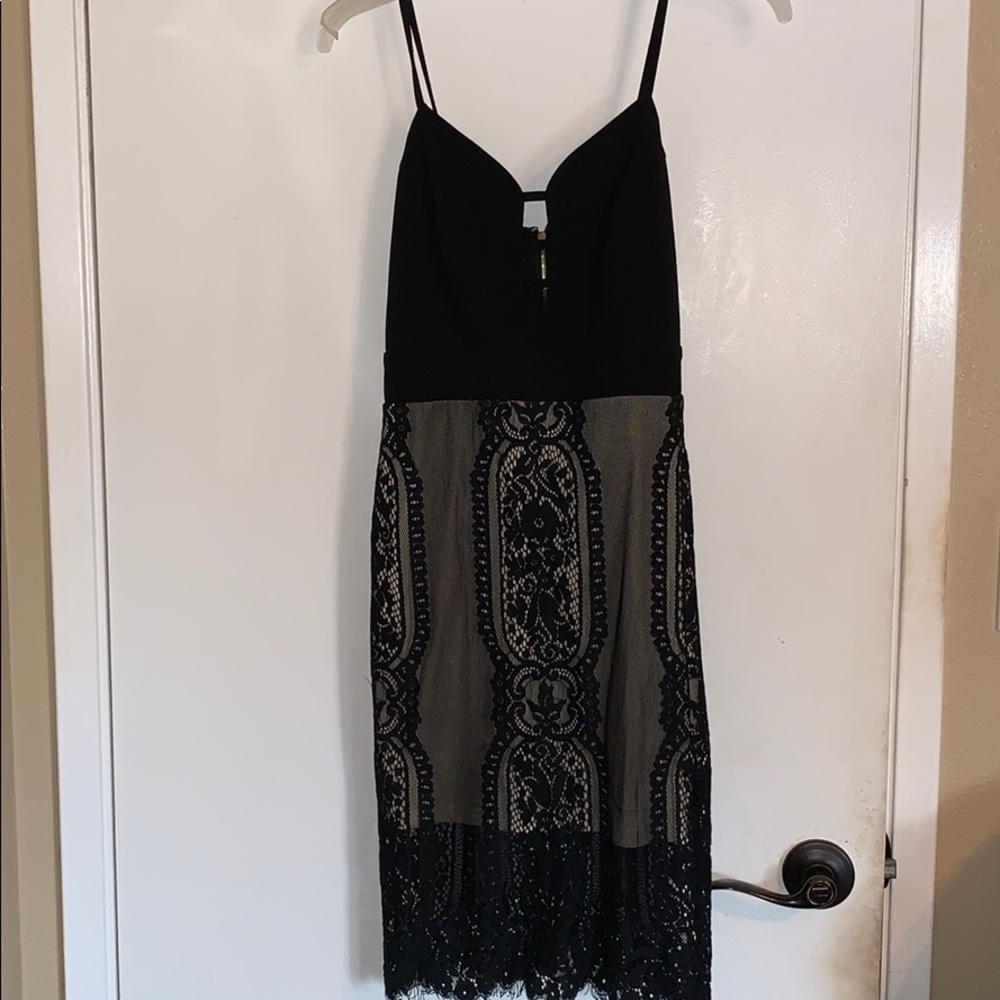 Black and beige lace dress